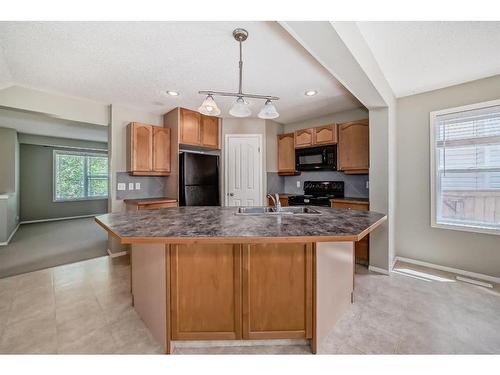 329 Eversyde Circle Sw, Calgary, AB - Indoor Photo Showing Kitchen