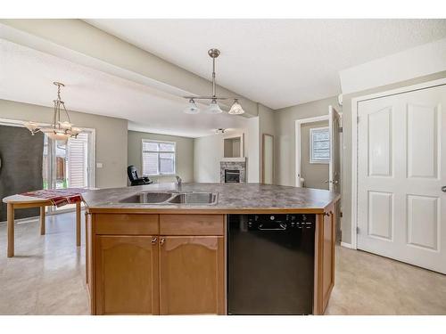 329 Eversyde Circle Sw, Calgary, AB - Indoor Photo Showing Kitchen With Double Sink