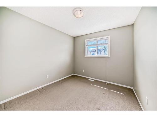 329 Eversyde Circle Sw, Calgary, AB - Indoor Photo Showing Bedroom