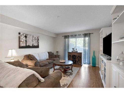 103-3000 Citadel Meadow Point Nw, Calgary, AB - Indoor Photo Showing Living Room