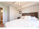 4202-1620 70 Street, Calgary, AB  - Indoor Photo Showing Bedroom 