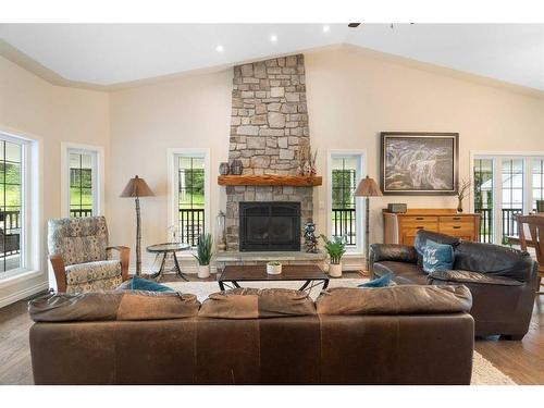 147-5417 Highway 579, Rural Mountain View County, AB - Indoor Photo Showing Living Room With Fireplace