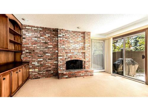 66 Willow Park Green Se, Calgary, AB - Indoor With Fireplace