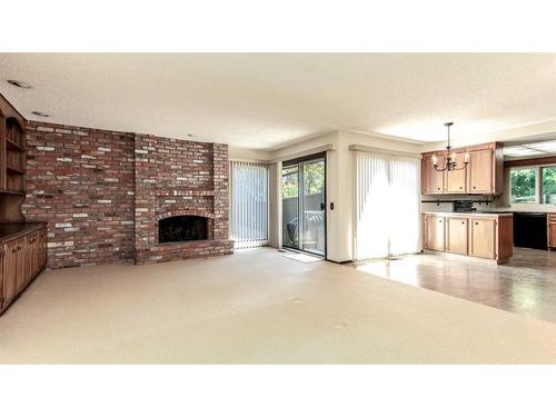 66 Willow Park Green Se, Calgary, AB - Indoor Photo Showing Other Room With Fireplace