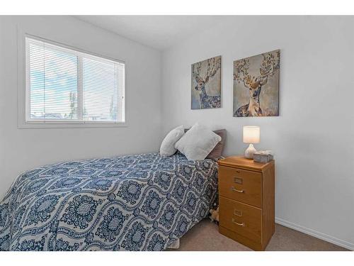 169 Eversyde Boulevard Sw, Calgary, AB - Indoor Photo Showing Bedroom