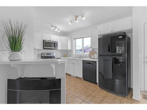 169 Eversyde Boulevard Sw, Calgary, AB - Indoor Photo Showing Kitchen With Stainless Steel Kitchen With Upgraded Kitchen