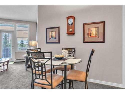 208-1 Crystal Green, Okotoks, AB - Indoor Photo Showing Kitchen