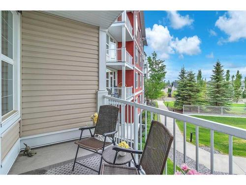 208-1 Crystal Green, Okotoks, AB - Outdoor With Balcony With Exterior