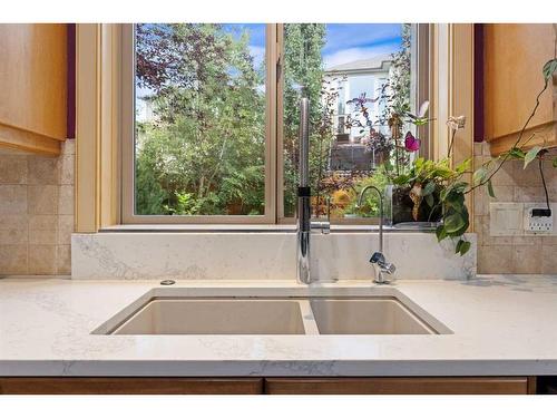 393 Banister Drive, Okotoks, AB - Indoor Photo Showing Kitchen With Double Sink