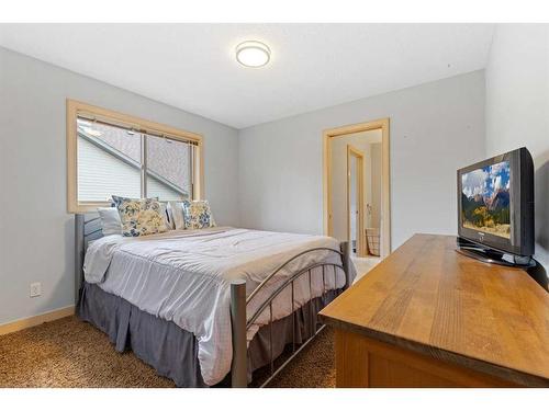 393 Banister Drive, Okotoks, AB - Indoor Photo Showing Bedroom