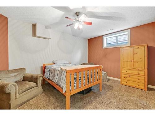 393 Banister Drive, Okotoks, AB - Indoor Photo Showing Bedroom