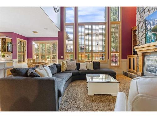 393 Banister Drive, Okotoks, AB - Indoor Photo Showing Living Room With Fireplace