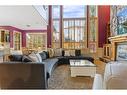 393 Banister Drive, Okotoks, AB  - Indoor Photo Showing Living Room With Fireplace 