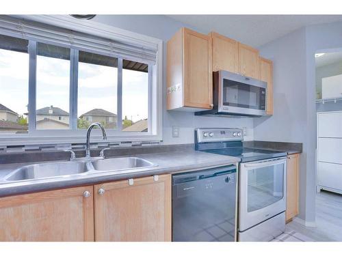 347 Elgin View Se, Calgary, AB - Indoor Photo Showing Kitchen With Double Sink