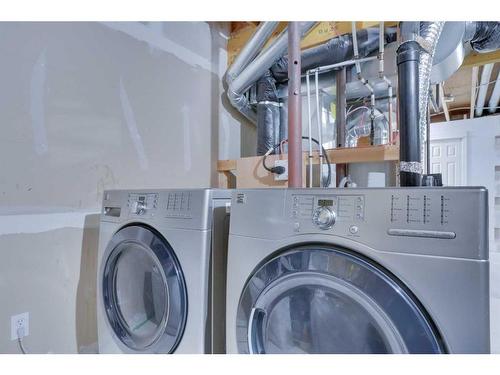 347 Elgin View Se, Calgary, AB - Indoor Photo Showing Laundry Room