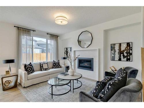 328 Legacy Circle Se, Calgary, AB - Indoor Photo Showing Living Room With Fireplace