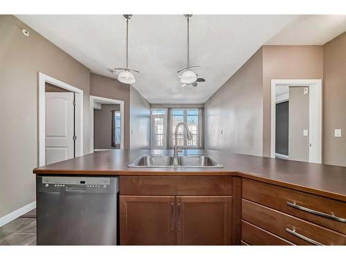 314-15304 Bannister Road Se, Calgary, AB - Indoor Photo Showing Kitchen With Double Sink