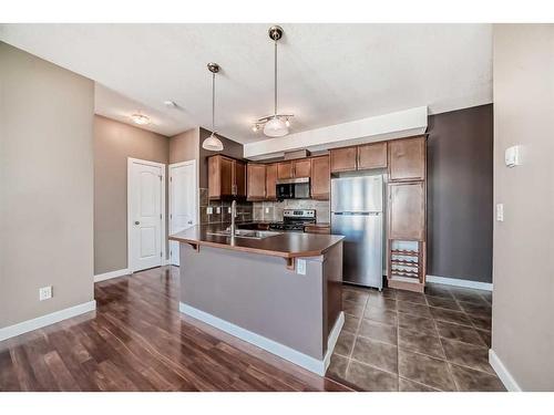 314-15304 Bannister Road Se, Calgary, AB - Indoor Photo Showing Kitchen