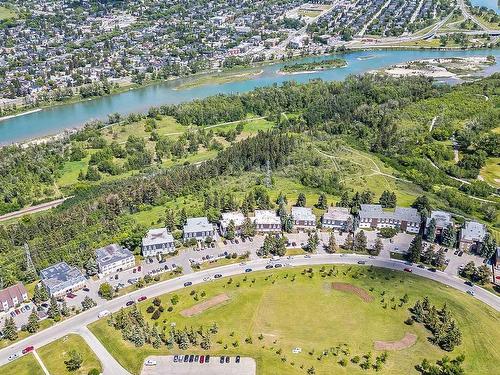 102-320 Cedar Crescent Sw, Calgary, AB - Outdoor With Body Of Water With View