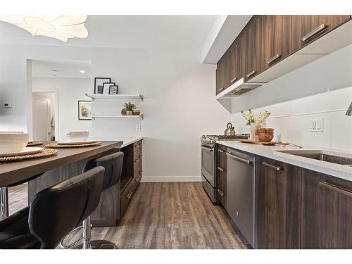 301-730 5 Street Ne, Calgary, AB - Indoor Photo Showing Kitchen With Upgraded Kitchen
