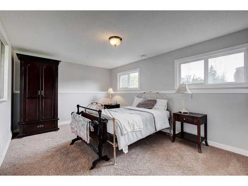 243 Flett Drive Ne, Airdrie, AB - Indoor Photo Showing Bedroom