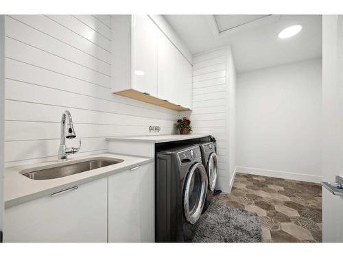 5507 Buckboard Road Nw, Calgary, AB - Indoor Photo Showing Laundry Room