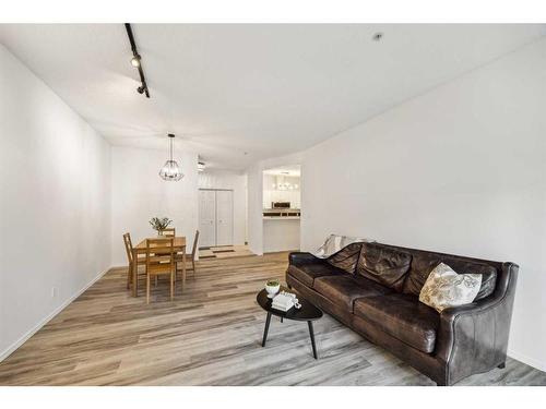 103-15212 Bannister Road Se, Calgary, AB - Indoor Photo Showing Living Room