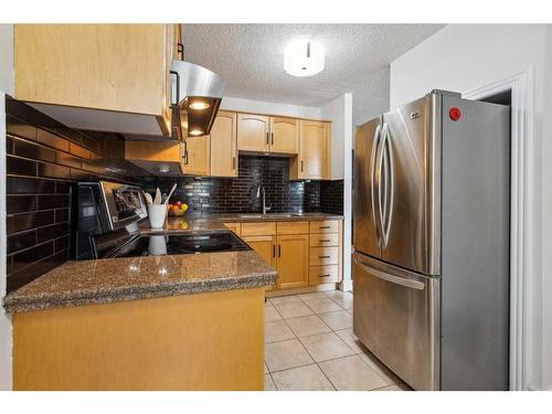101-1123 13 Avenue Sw, Calgary, AB - Indoor Photo Showing Kitchen