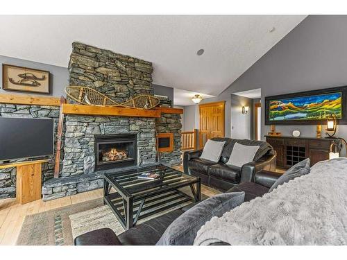 116 Casale Place, Canmore, AB - Indoor Photo Showing Living Room With Fireplace