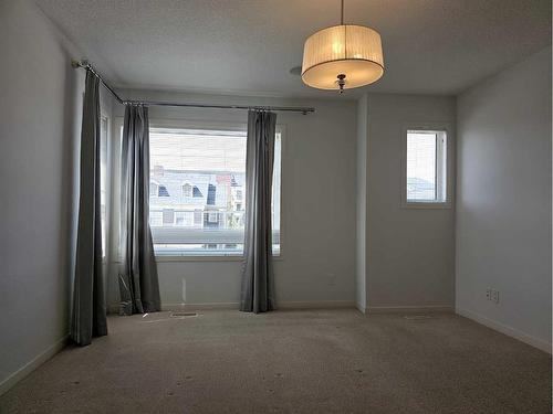 62 Copperpond Heath Se, Calgary, AB - Indoor Photo Showing Other Room