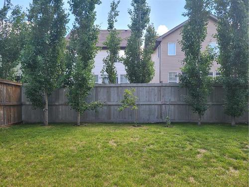 62 Copperpond Heath Se, Calgary, AB - Outdoor With Backyard