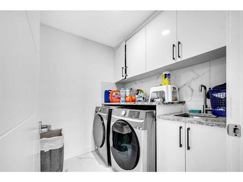 4516 84 Avenue Ne, Calgary, AB - Indoor Photo Showing Laundry Room