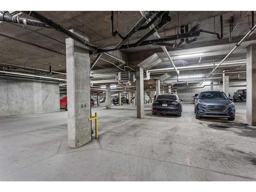 208-5115 Richard Road Sw, Calgary, AB - Indoor Photo Showing Garage