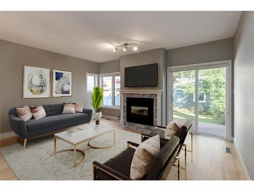 1720 Broadview Road Nw, Calgary, AB - Indoor Photo Showing Living Room With Fireplace