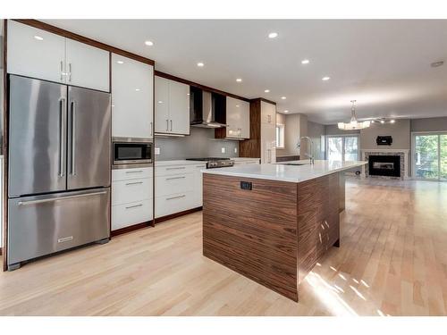 1720 Broadview Road Nw, Calgary, AB - Indoor Photo Showing Kitchen With Fireplace