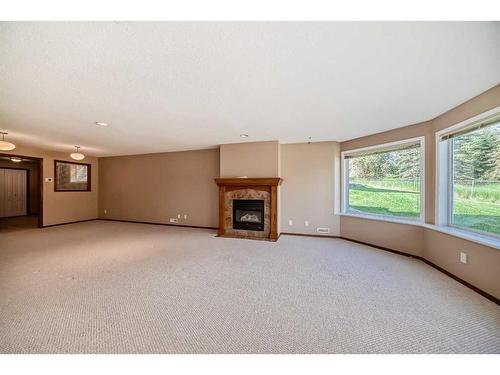 53 Hampstead Green Nw, Calgary, AB - Indoor With Fireplace