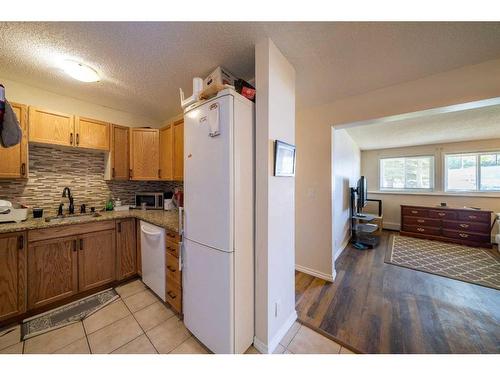 107A-5601 Dalton Drive Nw, Calgary, AB - Indoor Photo Showing Kitchen
