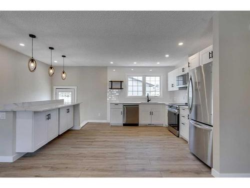 260 Penswood Way Se, Calgary, AB - Indoor Photo Showing Kitchen With Stainless Steel Kitchen