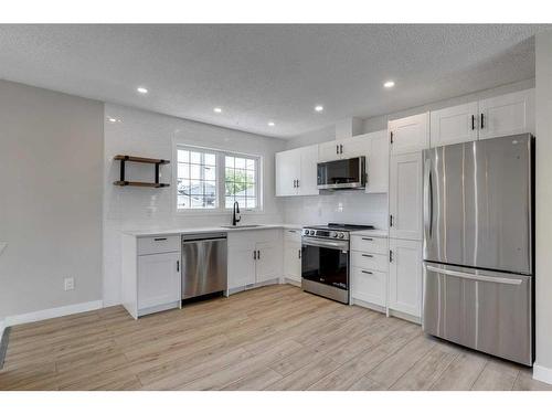 260 Penswood Way Se, Calgary, AB - Indoor Photo Showing Kitchen With Stainless Steel Kitchen