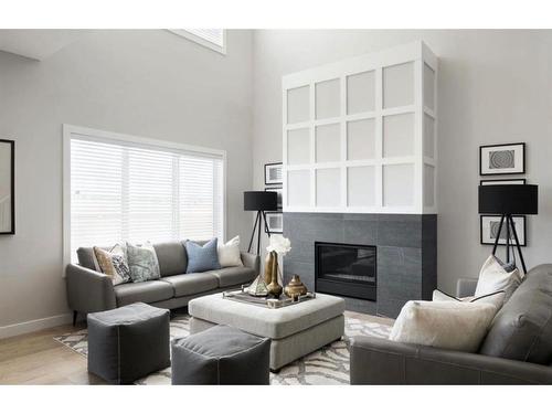 216 Crimson Ridge Place Nw, Calgary, AB - Indoor Photo Showing Living Room With Fireplace