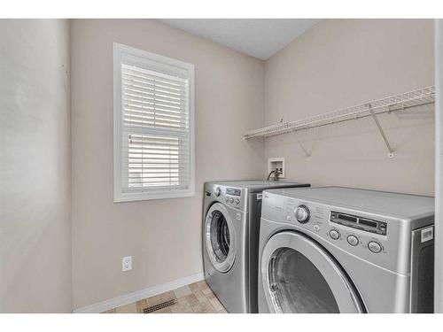 196 Panamount Circle Nw, Calgary, AB - Indoor Photo Showing Laundry Room