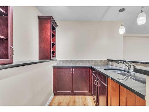 196 Panamount Circle Nw, Calgary, AB - Indoor Photo Showing Kitchen With Double Sink