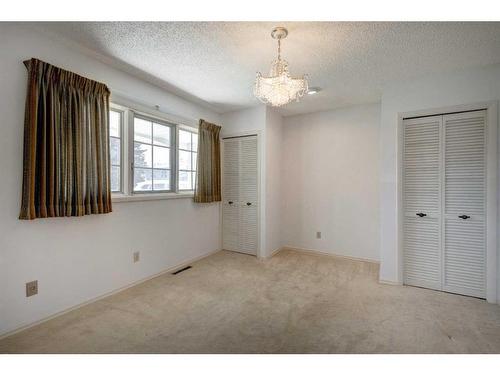 3220 Uplands Place Nw, Calgary, AB - Indoor Photo Showing Other Room