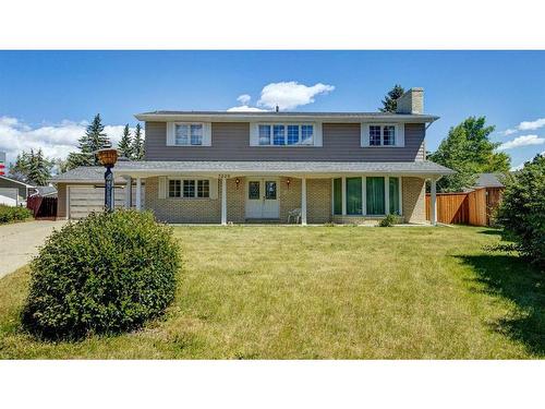 3220 Uplands Place Nw, Calgary, AB - Outdoor With Deck Patio Veranda With Facade