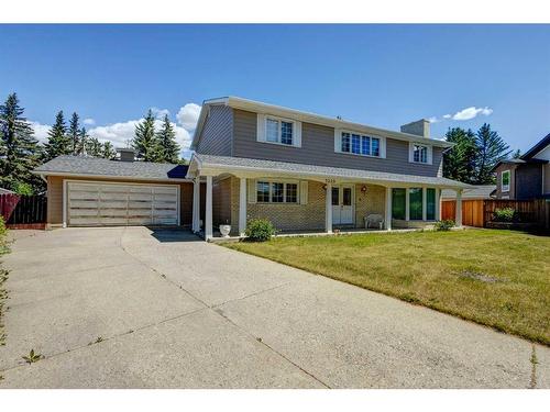 3220 Uplands Place Nw, Calgary, AB - Outdoor With Deck Patio Veranda