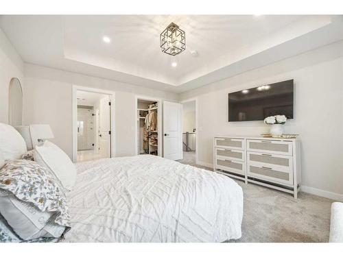 10 Highwood Drive, Okotoks, AB - Indoor Photo Showing Bedroom