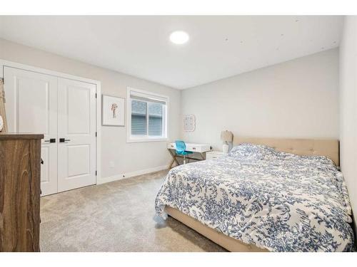 10 Highwood Drive, Okotoks, AB - Indoor Photo Showing Bedroom