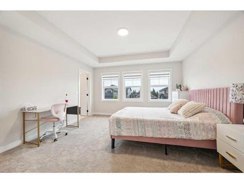 10 Highwood Drive, Okotoks, AB - Indoor Photo Showing Bedroom