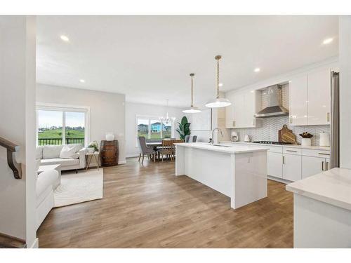 10 Highwood Drive, Okotoks, AB - Indoor Photo Showing Kitchen With Upgraded Kitchen