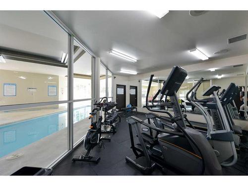 6-121 Village Heights Sw, Calgary, AB - Indoor Photo Showing Gym Room